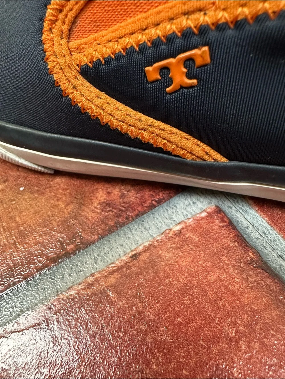 Tory Burch Navy Slip-On Shoes with Orange Trim
